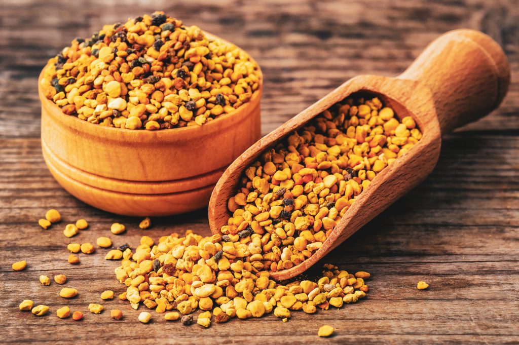 bee pollen in wooden bowl